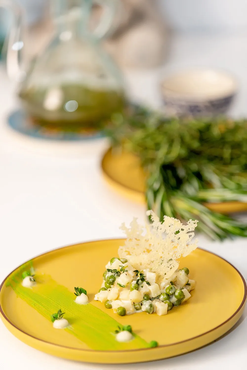 Plated celery root and green pea risotto