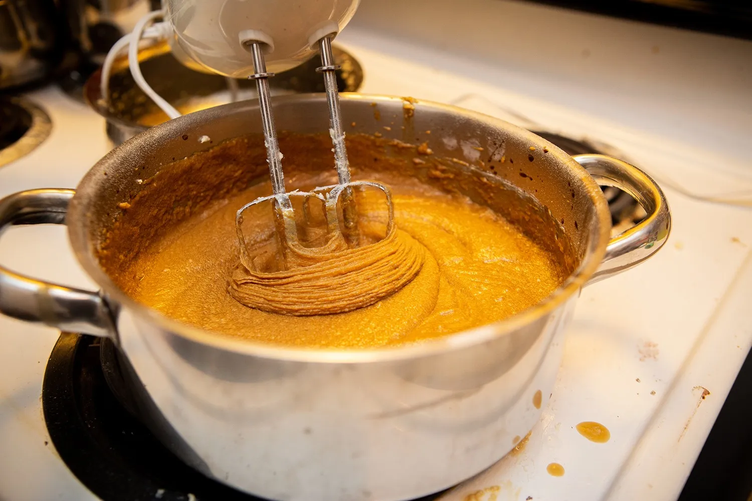 Mixing molasses and coffee for the batter